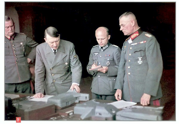 ADOLF HITLER, AT THE MAP TABLE WITH WILHELM KEITEL AND HIS